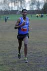 Eritrean athlete Weynay Ghebresilasie running for Sunderland Harriers on his way to third place in the Start First North East Harrier League, Jarrow.
